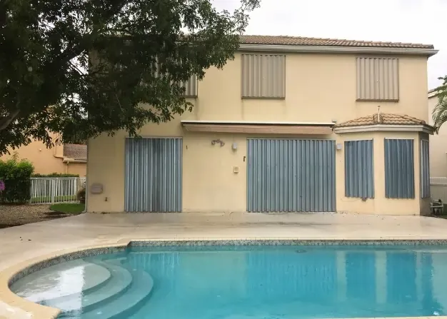 Close-up of impact resistant reinforced glass and aluminum window frame