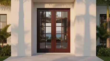 Double French doors with glass panes and tropical landscape view
