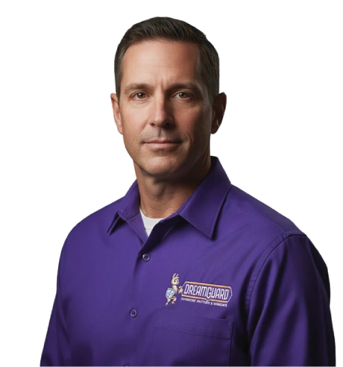 Portrait of technician in purple SERVPRO shirt posed against white background for professional branding.